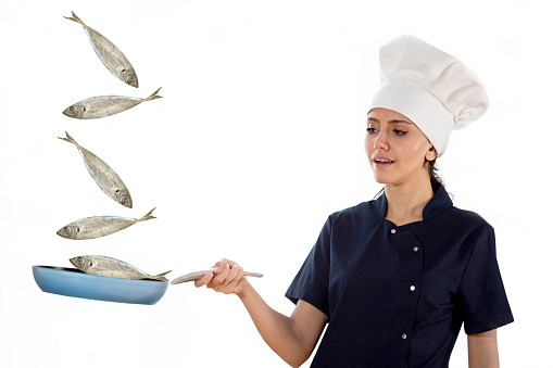 young chef woman holding pan