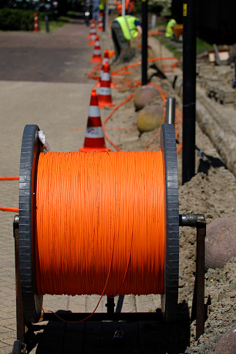 Installation and connecting fibre optic cables to neighbouring houses