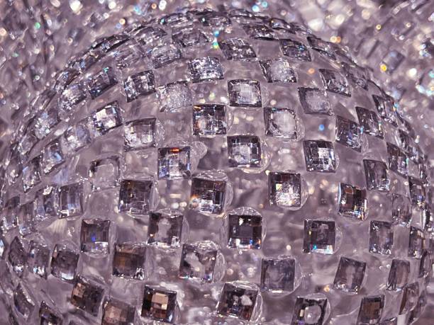 istock Christmas shiny purple glass sphere backgrounds. 1446523533