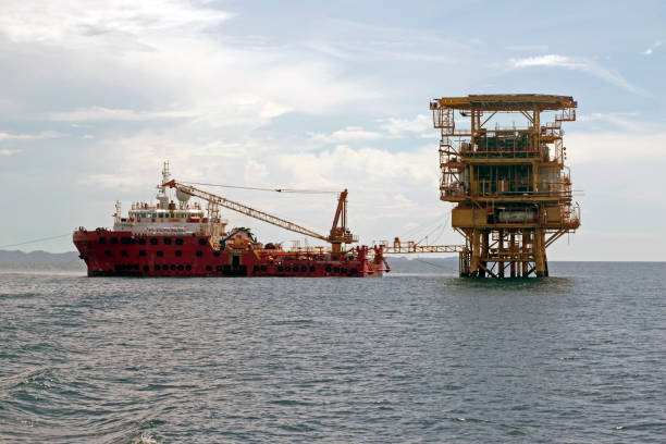 istock Oil rigs and supply boat 1446523778