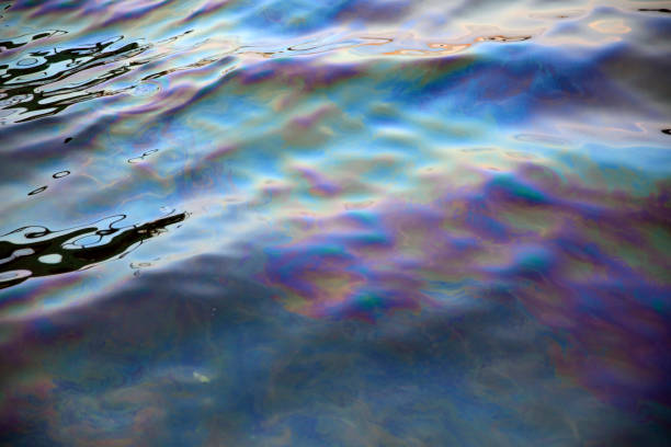 Oil spillage in open water stock photo