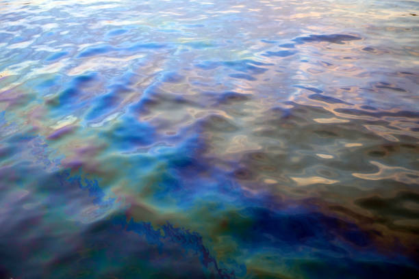 Clear turquoise water surface texture with ripples on the surface