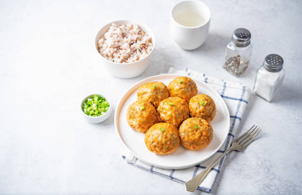 istock Fresh cooked meatballs in tomato sauce in a bowl 1446529733