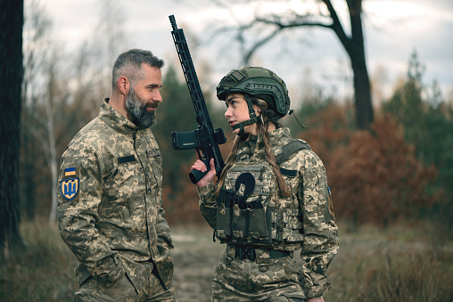 Smiling ukrainian soldiers dressed military uniform on combat duty