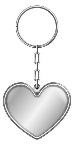 istock Steel heart trinket. Realistic keychain with metal ring 1446550910
