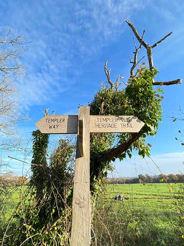 Wooden signpost for Templer on Stover Canal path, Teigngrace, Devon, England