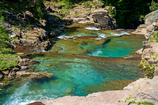 Crystal green water in natural pools. Gradas de Soaso waterfalls. Ordesa National Park. Pyrenees. Spain