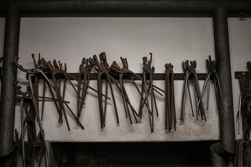 blacksmith tools and metal blanks in privet forge. High quality photo