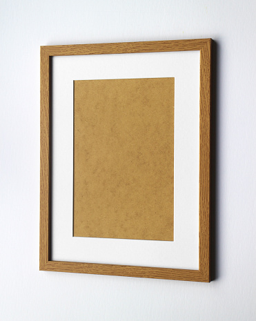 An empty wooden frame with room for your image. The frame itself fits a 16x12