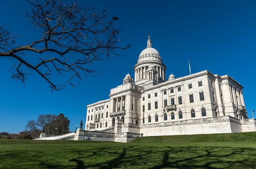 Beautiful day at The Rhode Island State House, the capitol of the state of Rhode Island. The current Rhode Island State House is Rhode Island's seventh state house and the second in Providence after the Old State House. The building is covered with white Georgia marble and was constructed from 1895 to 1904.