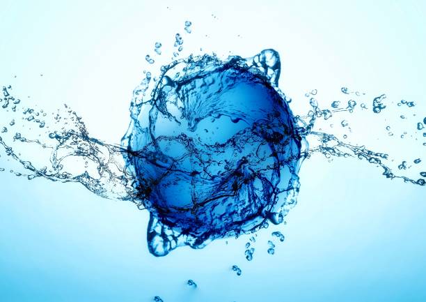 istock 3d illustration combining blue water splash and blue sphere in the concept of science 1446571146