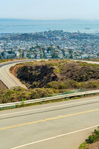 istock winding road on twin peaks with city 1446576406