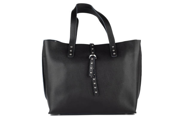 istock Black women's bag with fastening the strap isolated on a white background. 1446578286