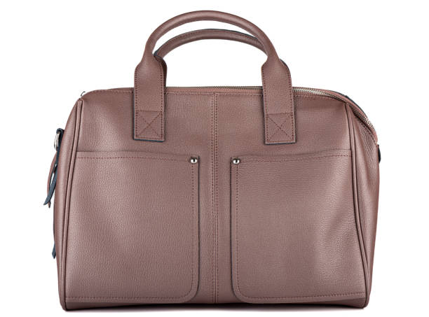 istock Brown women's bag with pockets isolated on a white background. 1446578290