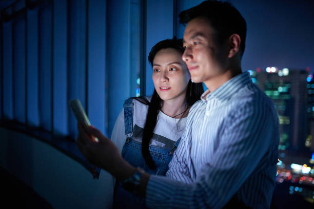 istock Middle Men & Women Looking or Video Calling at Smart Phone 1446590415