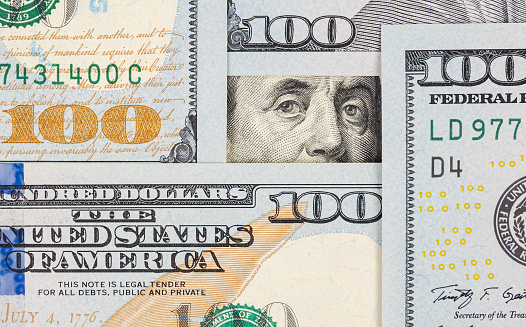 close up of US 100 dollar bills finance concept