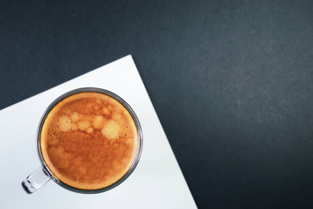 istock black coffee put on white and black table, freshness hot coffee 1446600177