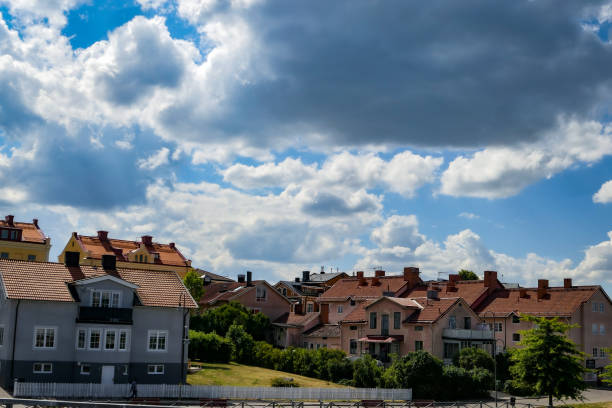 istock Low angle view of buildings in town against sky 1446602350