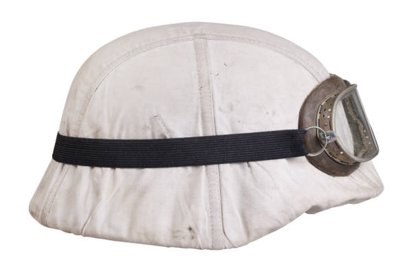 istock army helmet with protective goggles and white camouflage cover, type winter. Isolated on white background 1446603394