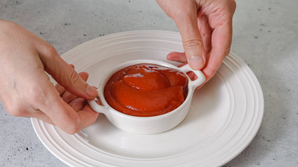 istock Ketchup in a bowl close-up on the kitchen table 1446613887
