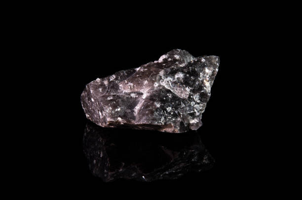 istock A shard of a raw, translucent black obsidian crystal 1446616561