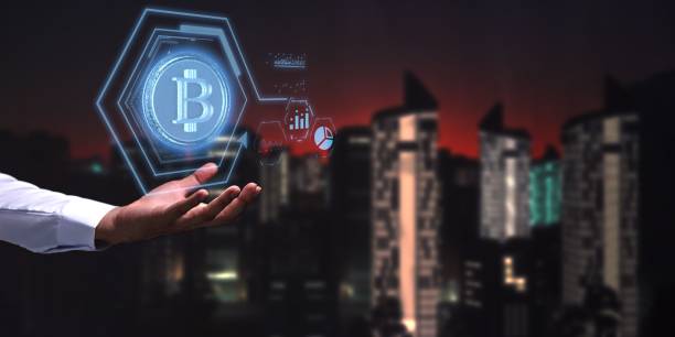 istock Person presenting a virtual projection of the cryptocurrency symbol 1446617061