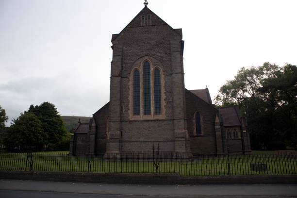 istock Church building facade surrounded by trees 1446617221