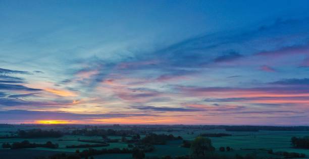 istock Blood red sunrise in Schleswig Holstein 1446617250