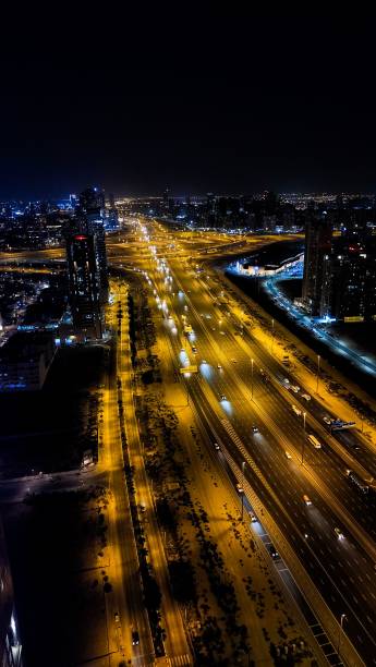 istock Aerial view of a highway at night 1446619257