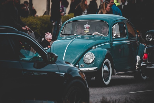 Nybro, Sweden – April 30, 2022: A retro Volkswagen Kafer car at an event with cruising old cars in a small town in Sweden.