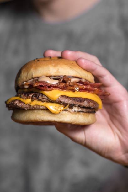 istock Vertical shot of a delicious burger 1446620739