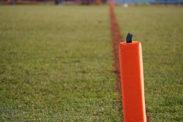 istock Orange football sideline post on a blurred background 1446621387