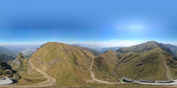 istock Blue sky over the green hills on a sunny day 1446621466