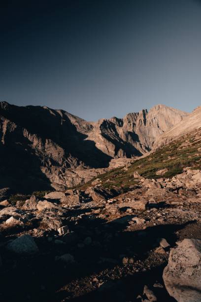 istock Scenic view of rocky mountains against clear cloudless sky 1446622076