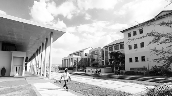 Johannesburg, South Africa – August 20, 2022: A view of buildings at a college campus in grayscale in Johannesburg, South Africa