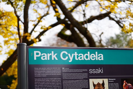 Poznan, Poland – October 30, 2022: A closeup of an information sign in the Cytadela park