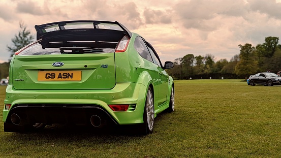 Lisburn, United Kingdom – May 06, 2022: A rear view of a green Ford Focus