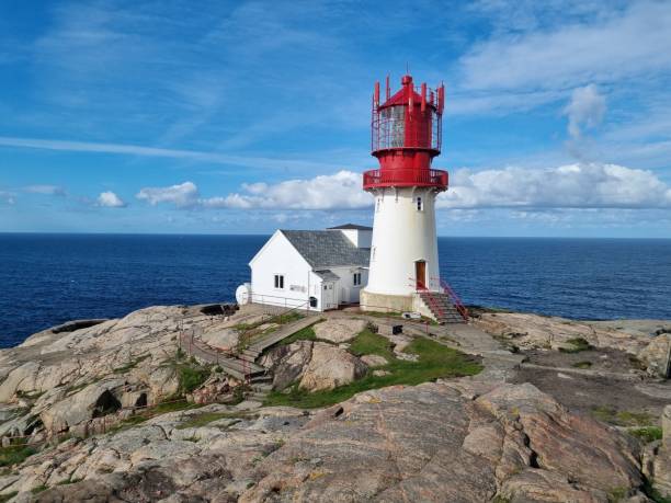 istock Lindesnes Lighthouse on a rocky cliff in the morning 1446627335