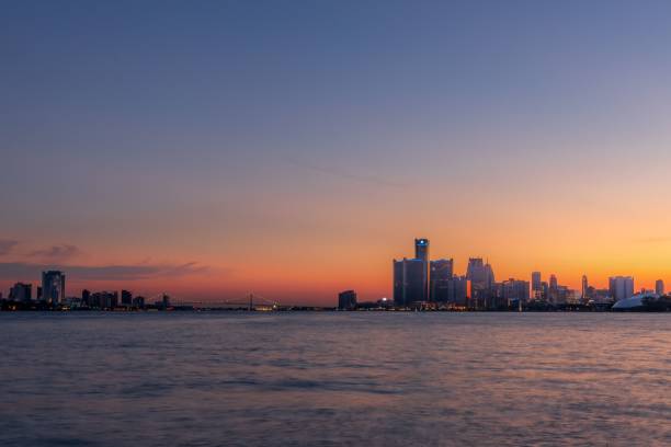istock Sea at sunset with a city in the background 1446629794