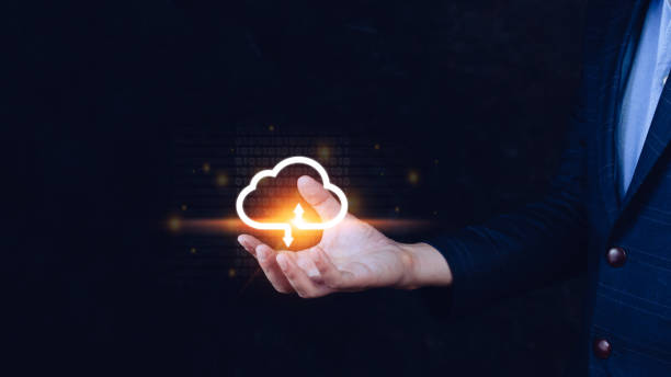 istock Businessman holding and giving virtual cloud icon computing with copy space to transfer data information and upload download application. technology transformation concept.Big data Concept 1446630819