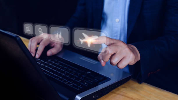 istock Businessman pointing finger touching to select flight by pressing touch screen airplane button,Business Airplane transportation concept 1446630945