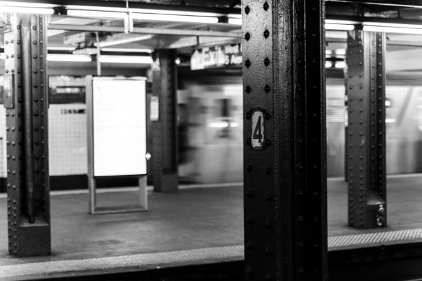 istock Greyscale shot of an empty New York subway station 1446632174
