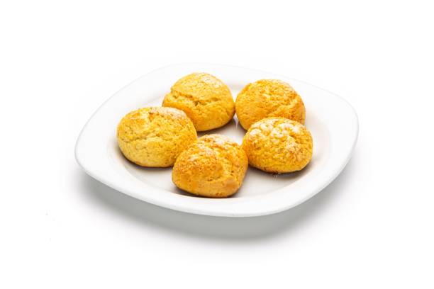 istock Delicious round cookies on white plate isolated on white background 1446633116