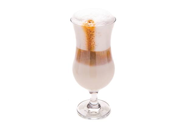 istock Coffee with syrup inside a glass cup on a white background. 1446633481