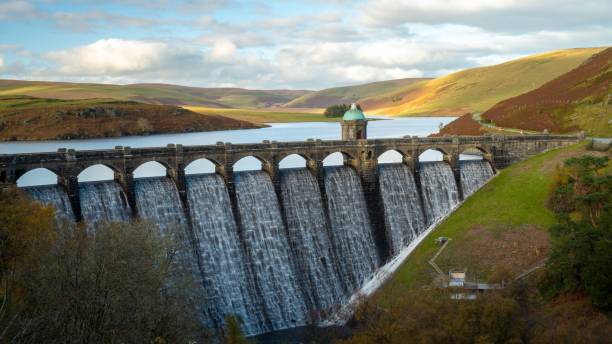 istock Stone brick bridge over a dam in the river 1446633644