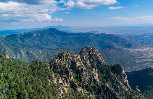 An aerial shot of the mountainous rocky landscapes seen from the Sandia peak in Albuquerque, NM, USA