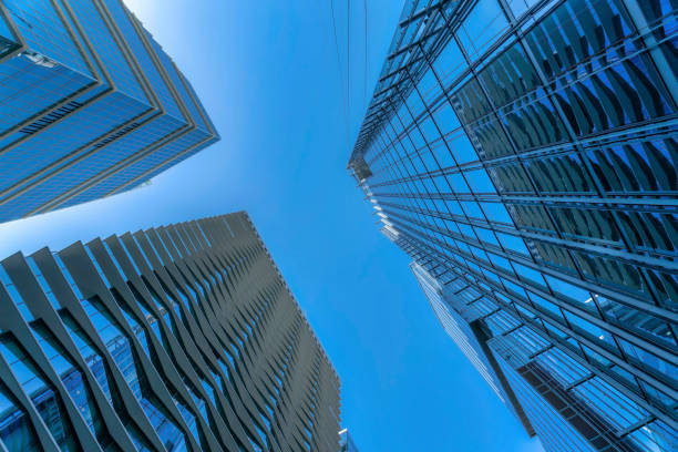 istock Modern apartments exterior and cloudless blue sky viewed from the bottom ground 1446638240