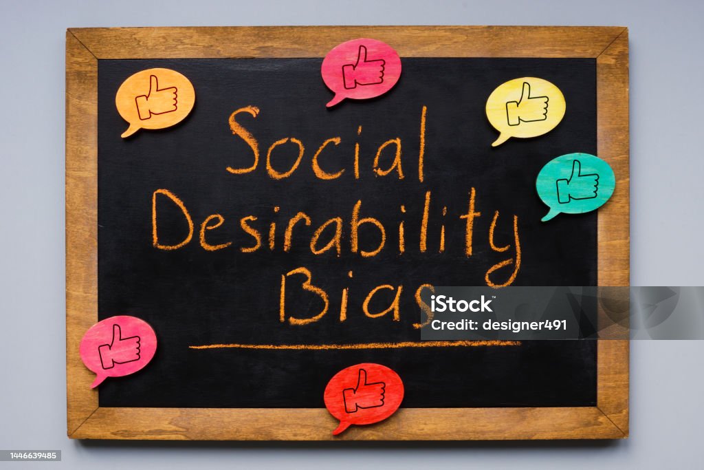 Small blackboard with an inscription Social desirability bias. A Small blackboard with an inscription Social desirability bias. Attitude Stock Photo
