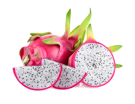 dragon fruit with drops of water on white background.