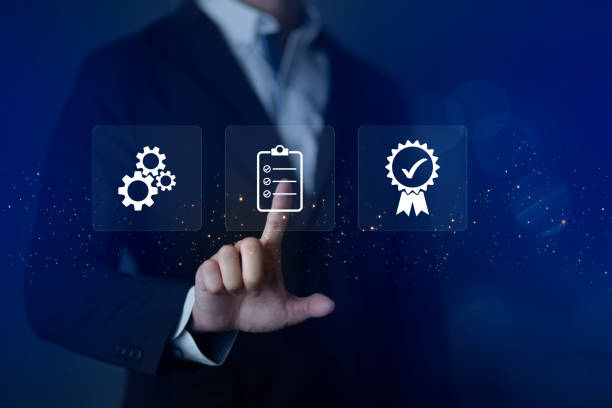 istock ISO Certification of standards quality control assurance business technology concept. Businessman touching virtual screen iso certification icon to guarantee. 1446651881